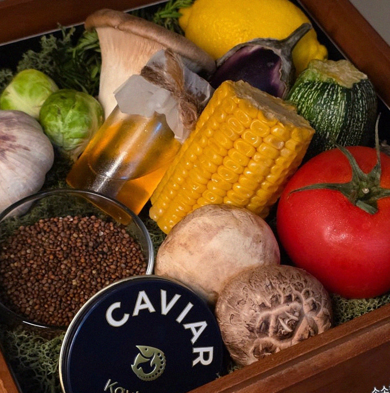 WOOARA Gwanghwamun · the signature Hanwoo showing — marbled beef cuts and caviar presented in a display chest