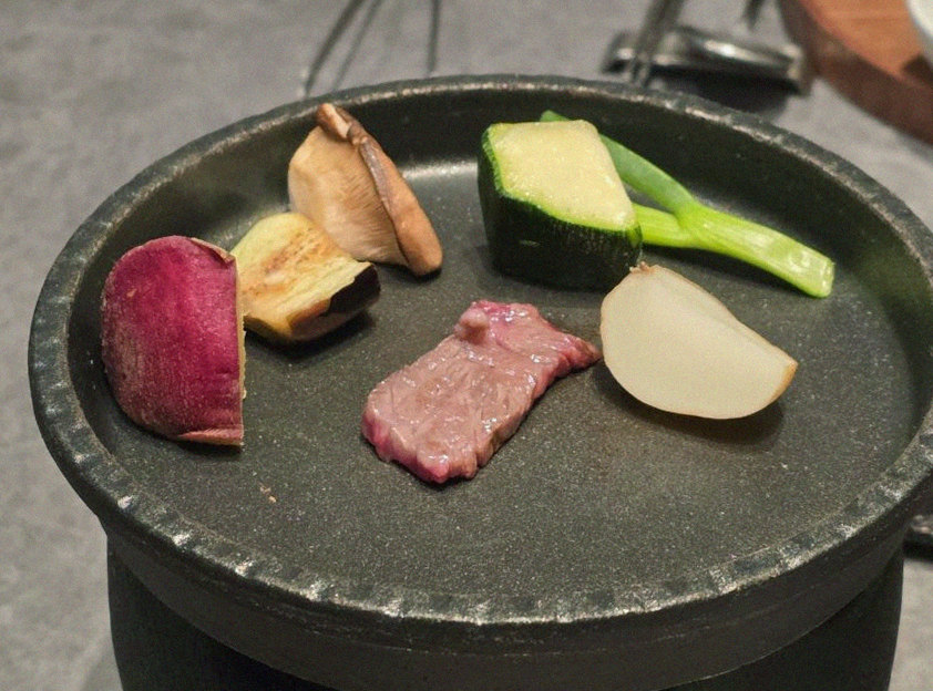 WOOHANA Jonggak · Hanwoo beef grilling over binchotan charcoal