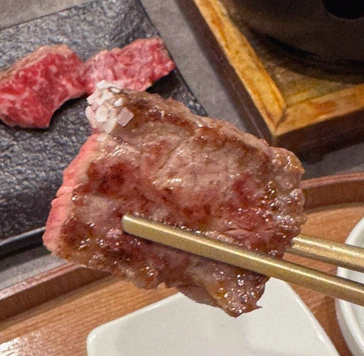 GOWOOGA Gwanghwamun · premium marbled Hanwoo beef presented before grilling