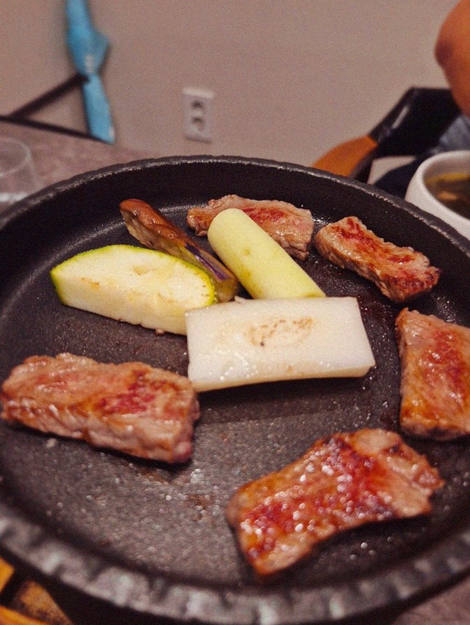 GOWOOGA Gwanghwamun · Hanwoo beef grilling over binchotan charcoal