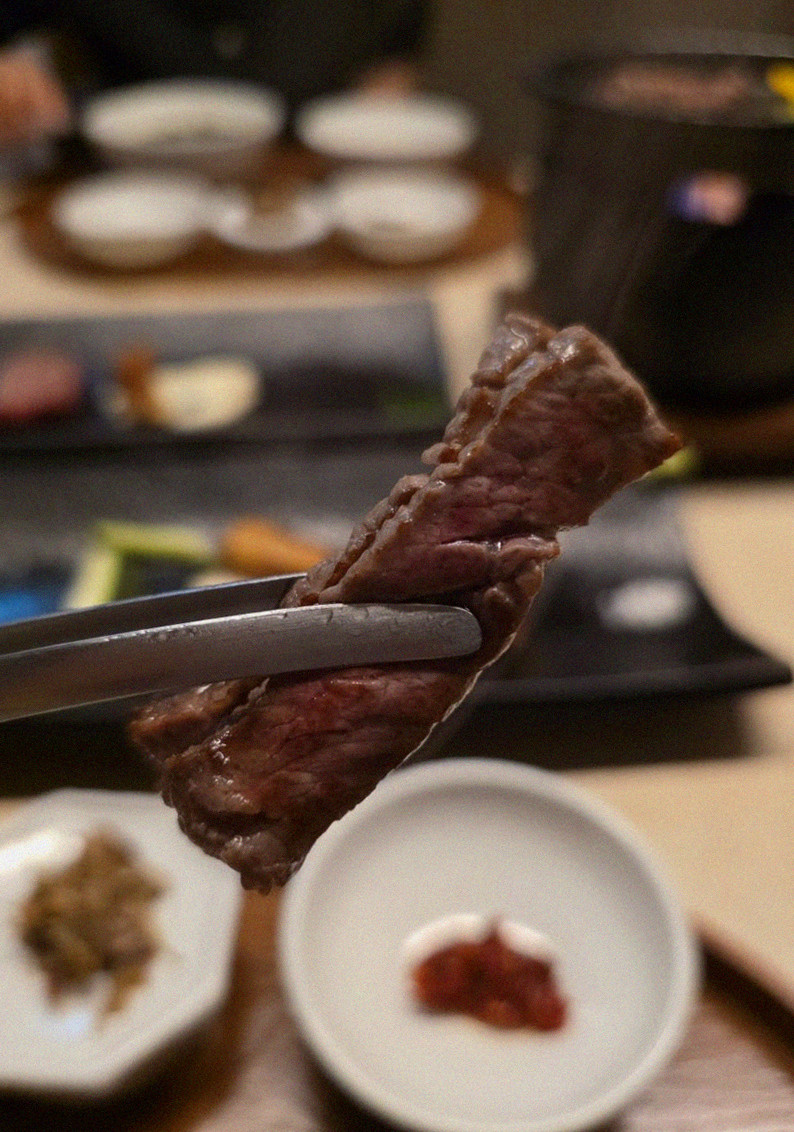 WOOARA Yeouido · premium marbled Hanwoo beef presented before grilling