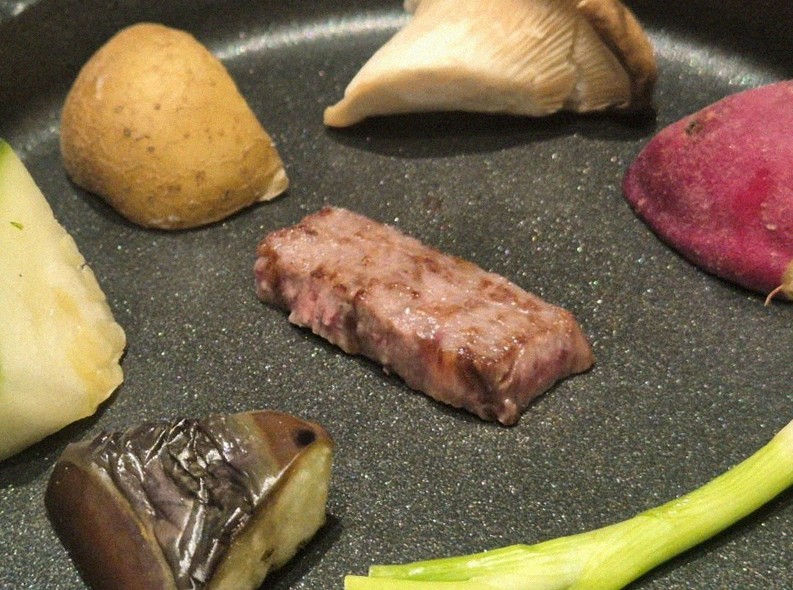 WOOHANA Jonggak · a plated course of Hanwoo beef