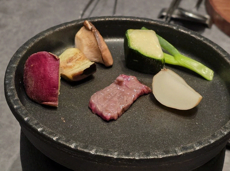 WOOHANA Jonggak · Hanwoo beef grilling over binchotan charcoal