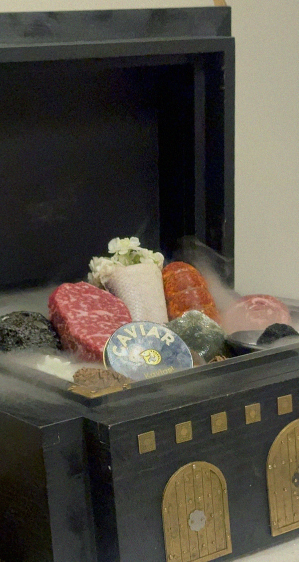 GOWOOGA Gwanghwamun · the signature Hanwoo showing — marbled beef cuts and caviar presented in a display chest