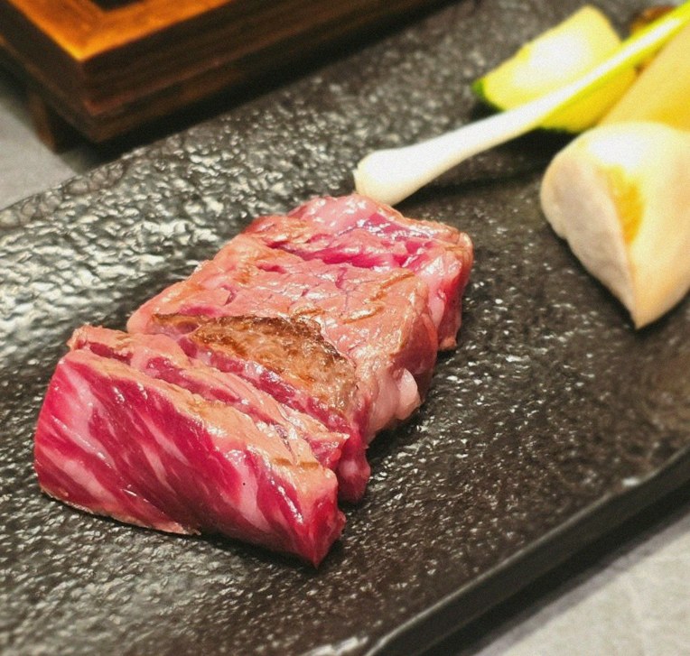 WOOHANA Jonggak · premium marbled Hanwoo beef presented before grilling