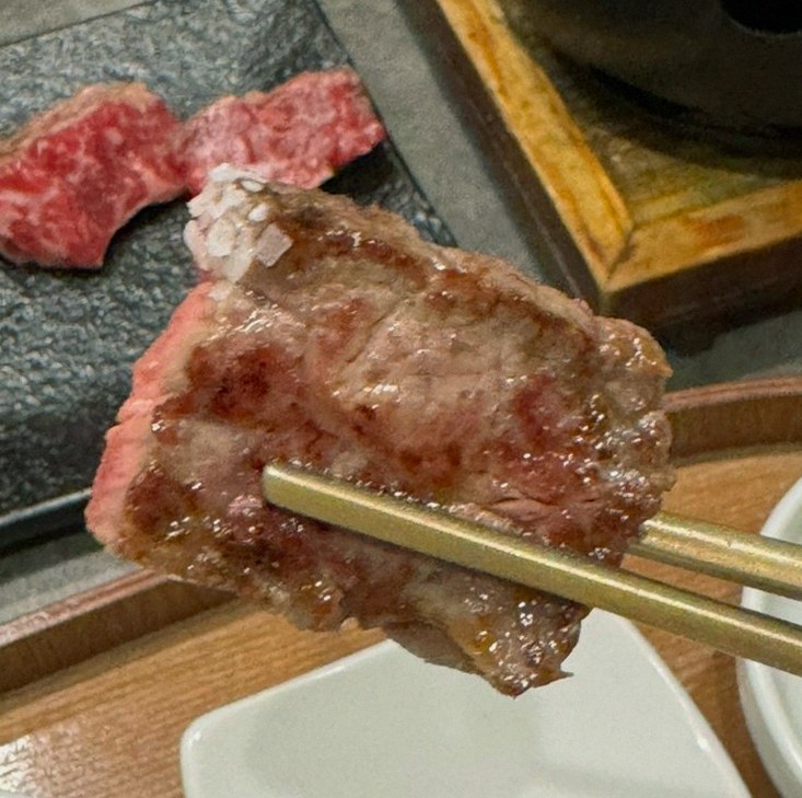 GOWOOGA Gwanghwamun · premium marbled Hanwoo beef presented before grilling