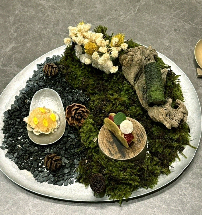 GOWOOGA Gwanghwamun · seafood course served alongside the beef