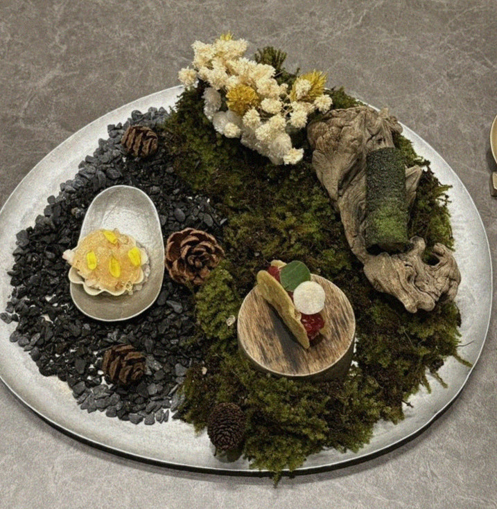 GOWOOGA Gwanghwamun · seafood course served alongside the beef