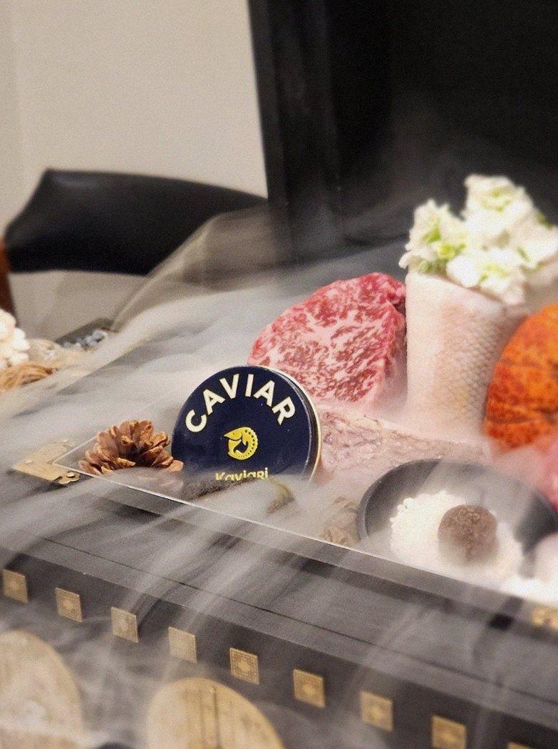 GOWOOGA Gwanghwamun · the signature Hanwoo showing — marbled beef cuts and caviar presented in a display chest