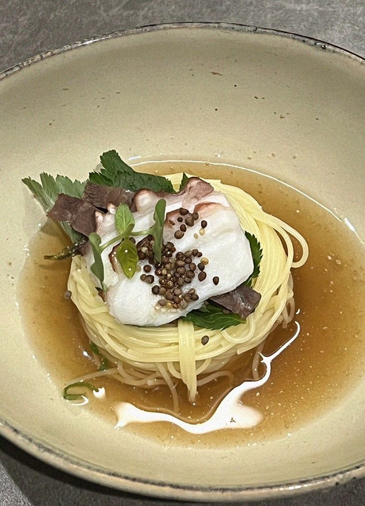 GOWOOGA Gwanghwamun · a plated course of Hanwoo beef