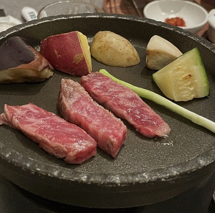 WOOHANA Yeouido · Hanwoo beef grilling over binchotan charcoal