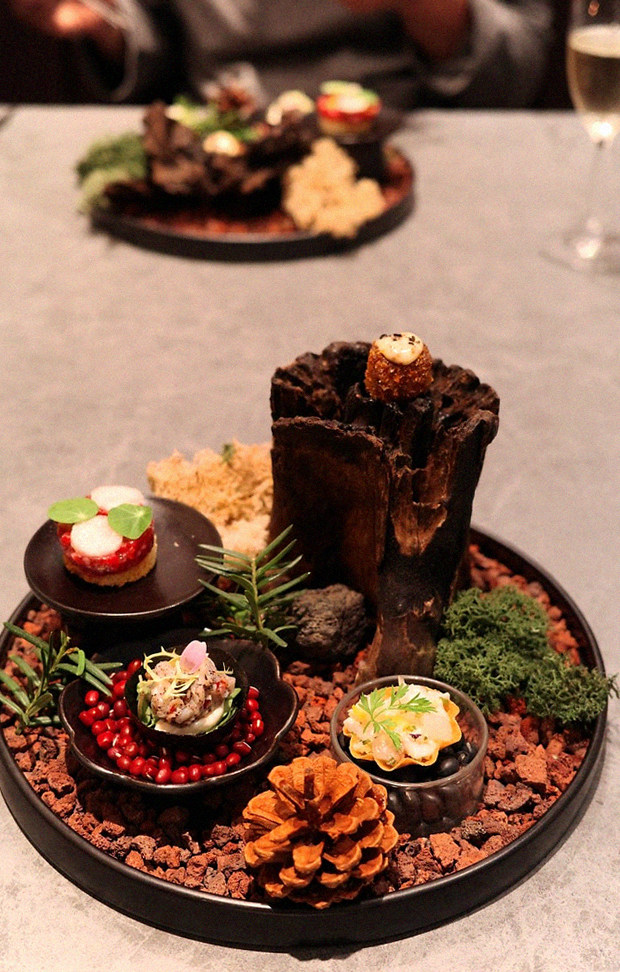 WOOHANA Yeouido · the signature Hanwoo showing — marbled beef cuts and caviar presented in a display chest
