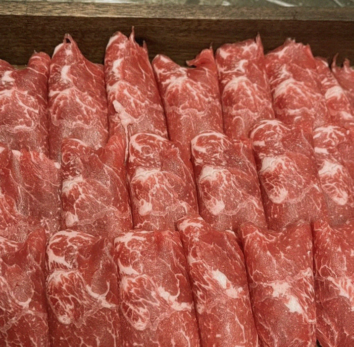 DAEBOJUNG City Hall · premium marbled Hanwoo beef presented before grilling