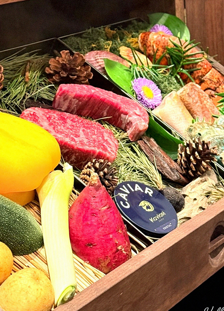 WOOHANA Jonggak · the signature Hanwoo showing — marbled beef cuts and caviar presented in a display chest