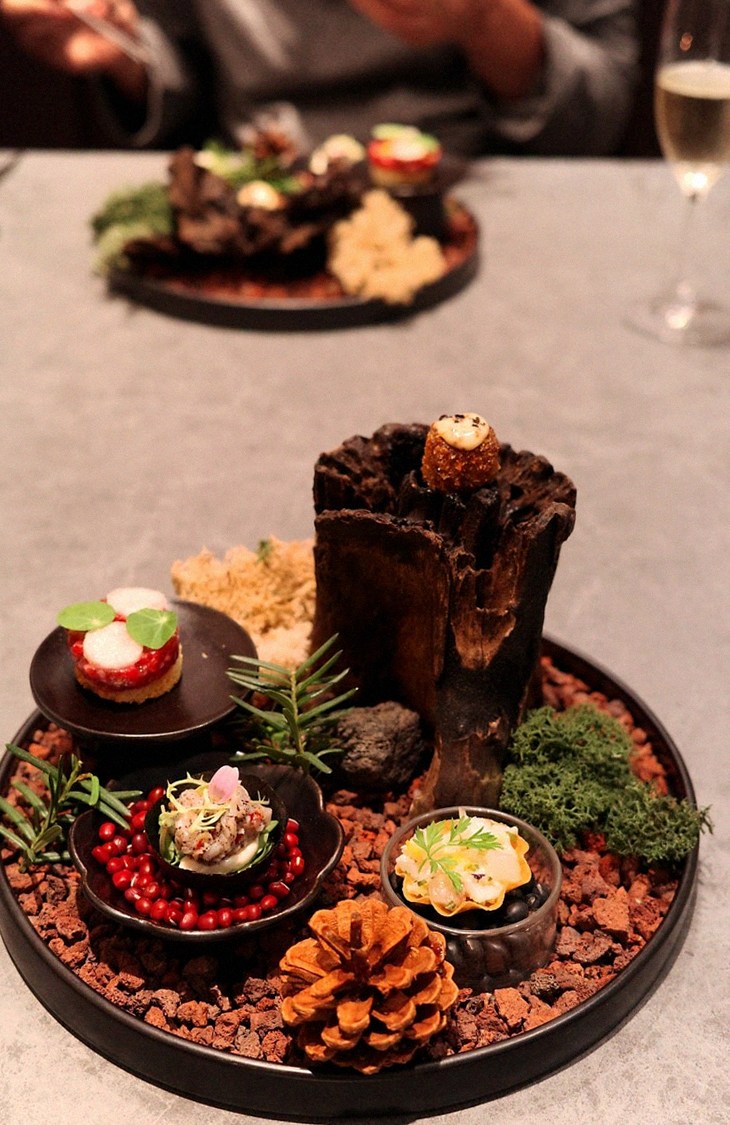 WOOHANA Jonggak · the signature Hanwoo showing — marbled beef cuts and caviar presented in a display chest