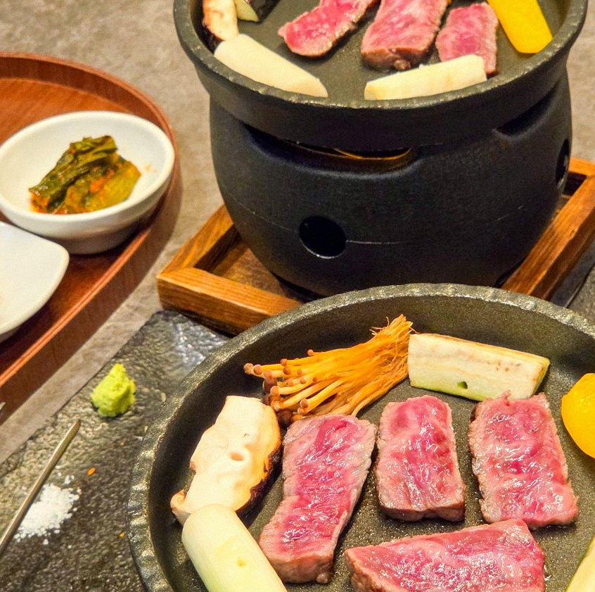 GOWOOGA Yeouido · the signature Hanwoo showing — marbled beef cuts and caviar presented in a display chest