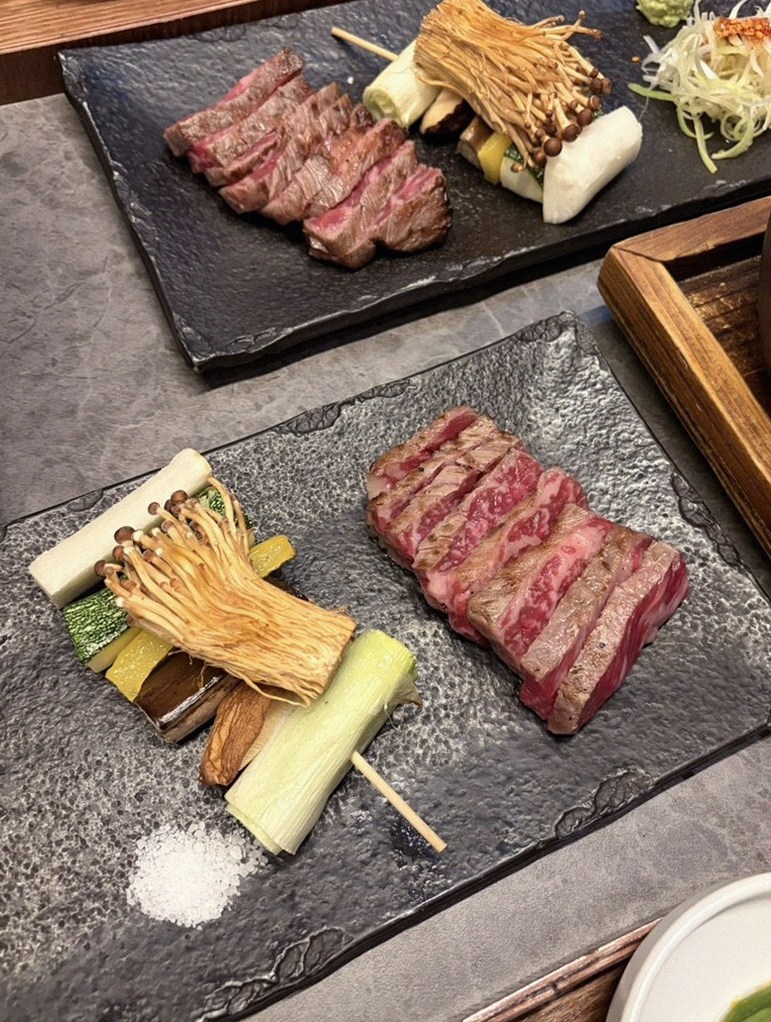 GOWOOGA Yeouido · premium marbled Hanwoo beef presented before grilling