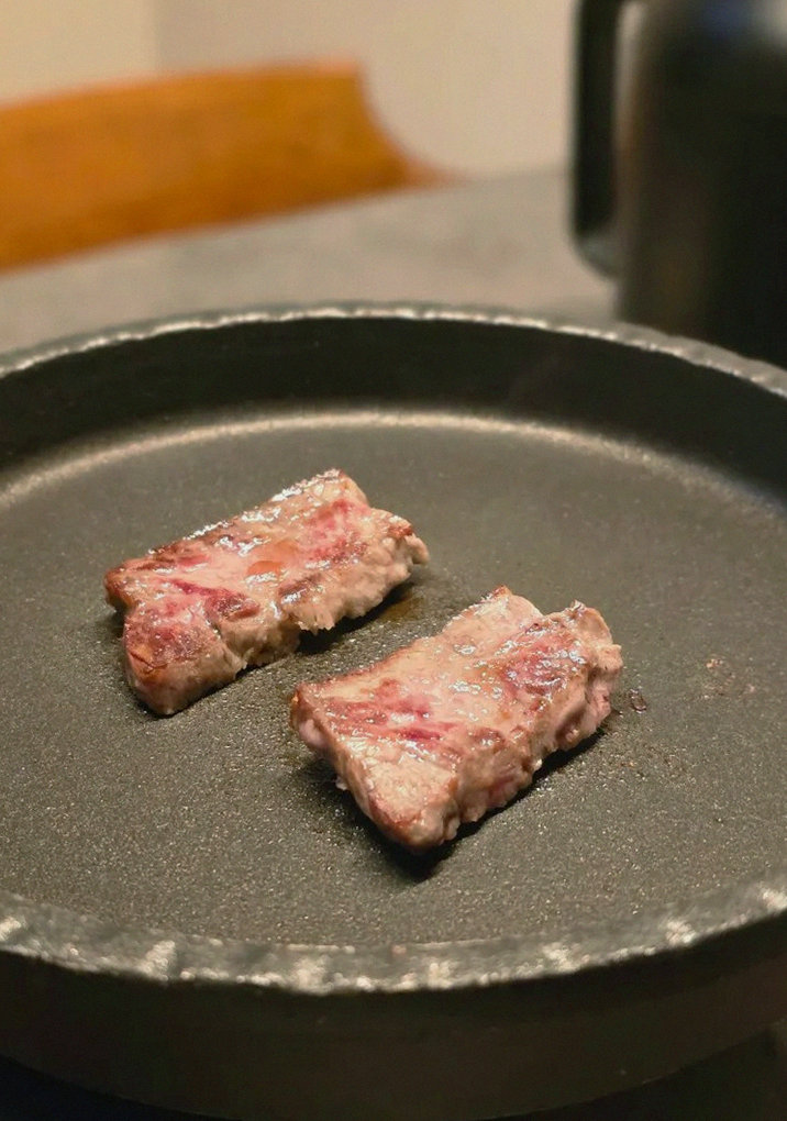 GOWOOGA Yeouido · premium marbled Hanwoo beef presented before grilling