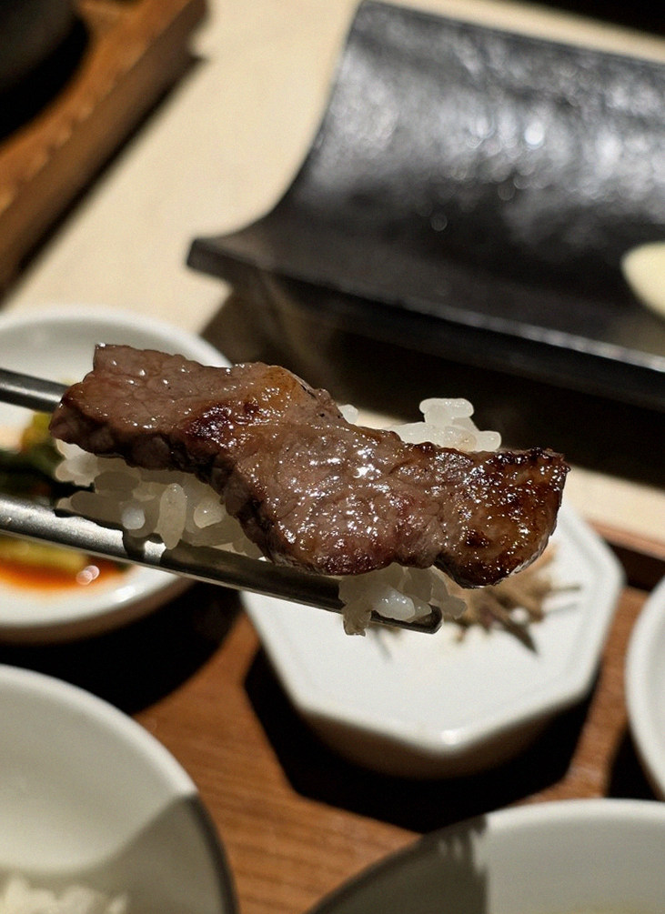WOOARA Yeouido · premium marbled Hanwoo beef presented before grilling