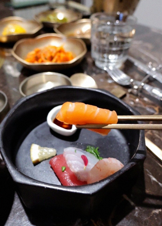 DAEBOJUNG Yeouido · seafood course served alongside the beef