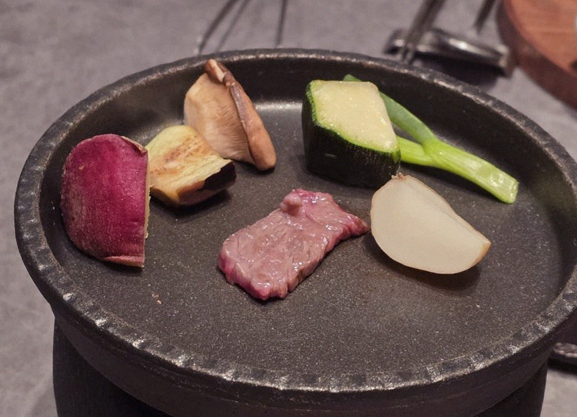 WOOHANA Jonggak · Hanwoo beef grilling over binchotan charcoal