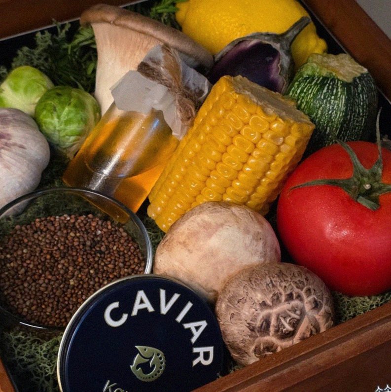 WOOARA Yeouido · the signature Hanwoo showing — marbled beef cuts and caviar presented in a display chest