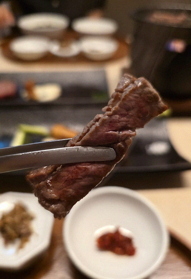 WOOARA Yeouido · premium marbled Hanwoo beef presented before grilling