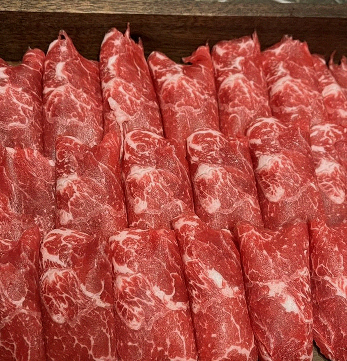 DAEBOJUNG City Hall · premium marbled Hanwoo beef presented before grilling