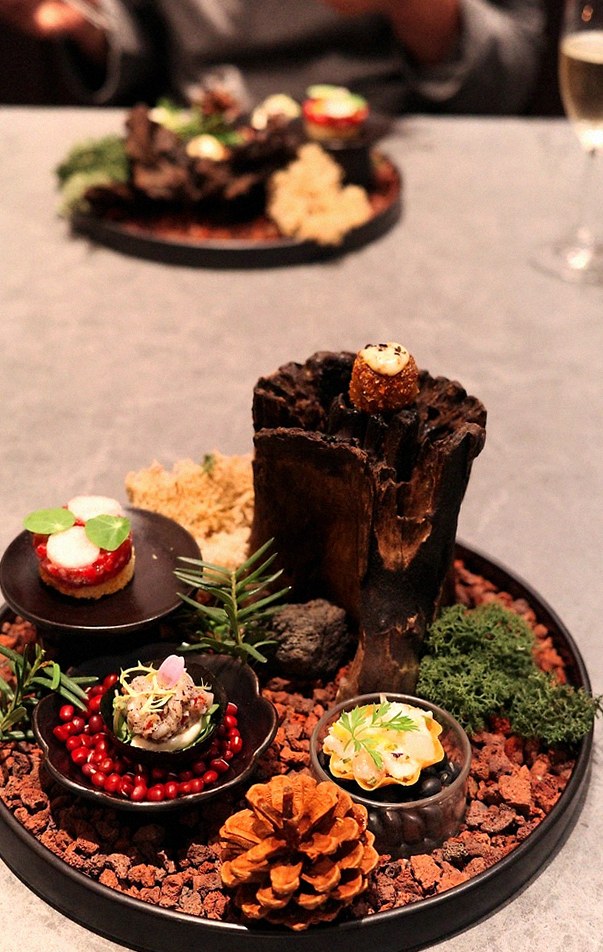 WOOHANA Yeouido · the signature Hanwoo showing — marbled beef cuts and caviar presented in a display chest