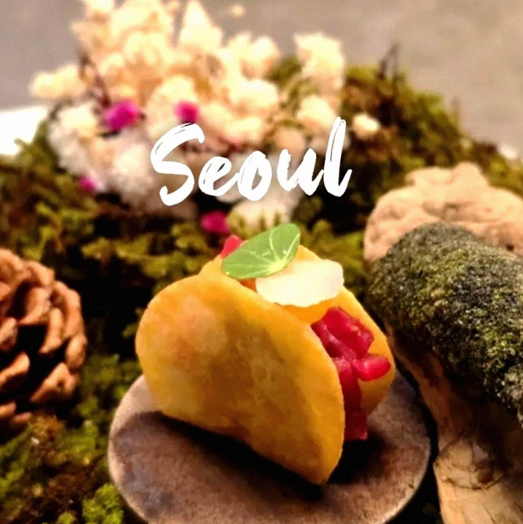 GOWOOGA Yeouido · seafood course served alongside the beef