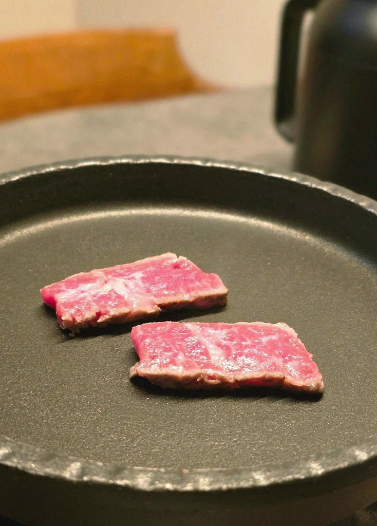 GOWOOGA Yeouido · premium marbled Hanwoo beef presented before grilling