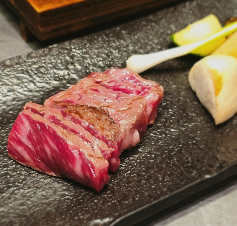 WOOHANA Yeouido · premium marbled Hanwoo beef presented before grilling