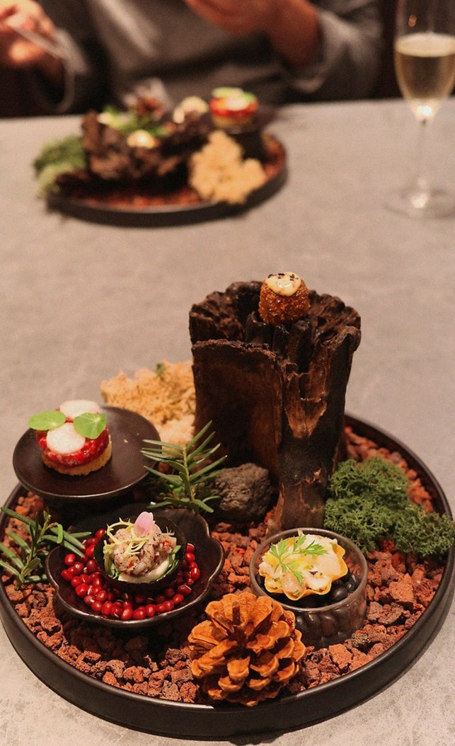 WOOHANA Yeouido · the signature Hanwoo showing — marbled beef cuts and caviar presented in a display chest
