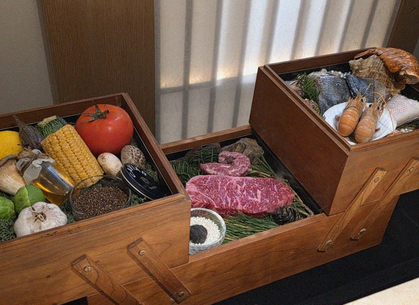 WOOARA Gwanghwamun · the signature Hanwoo showing — marbled beef cuts and caviar presented in a display chest