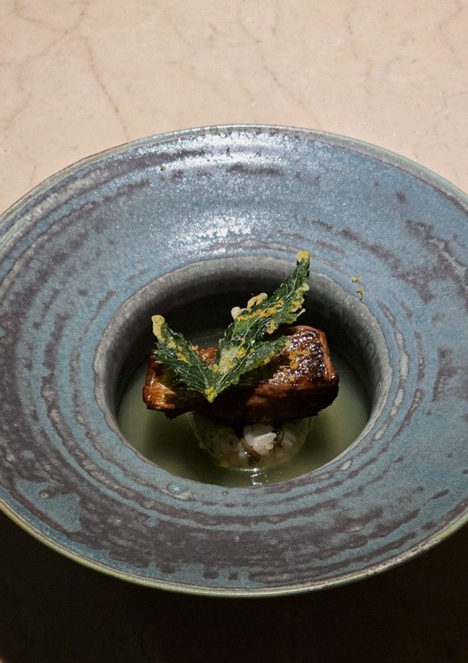 WOOARA Gwanghwamun · a plated course of Hanwoo beef
