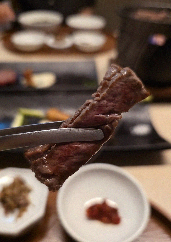 WOOARA Yeouido · premium marbled Hanwoo beef presented before grilling