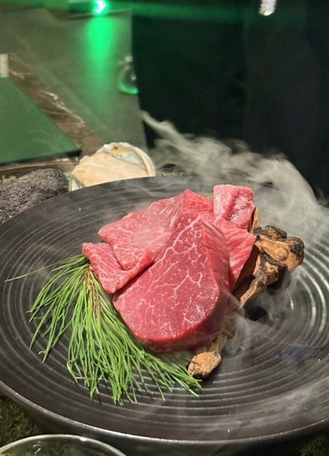 DAEBOJUNG City Hall · the signature Hanwoo showing — marbled beef cuts and caviar presented in a display chest