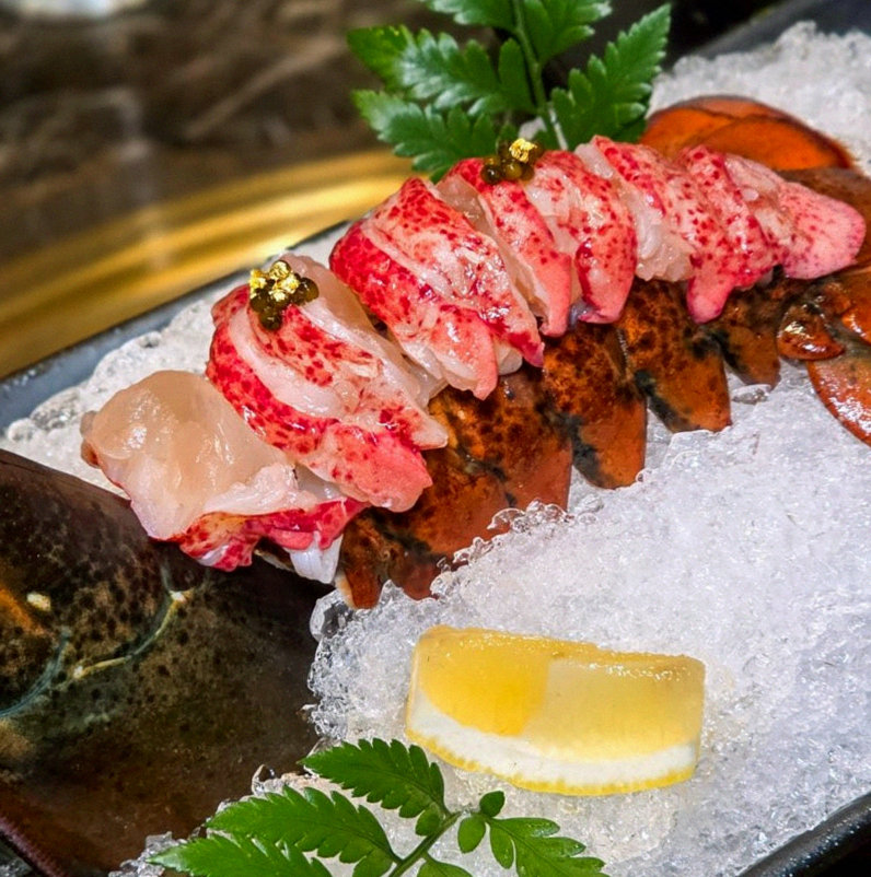 DAEBOJUNG City Hall · the signature Hanwoo showing — marbled beef cuts and caviar presented in a display chest