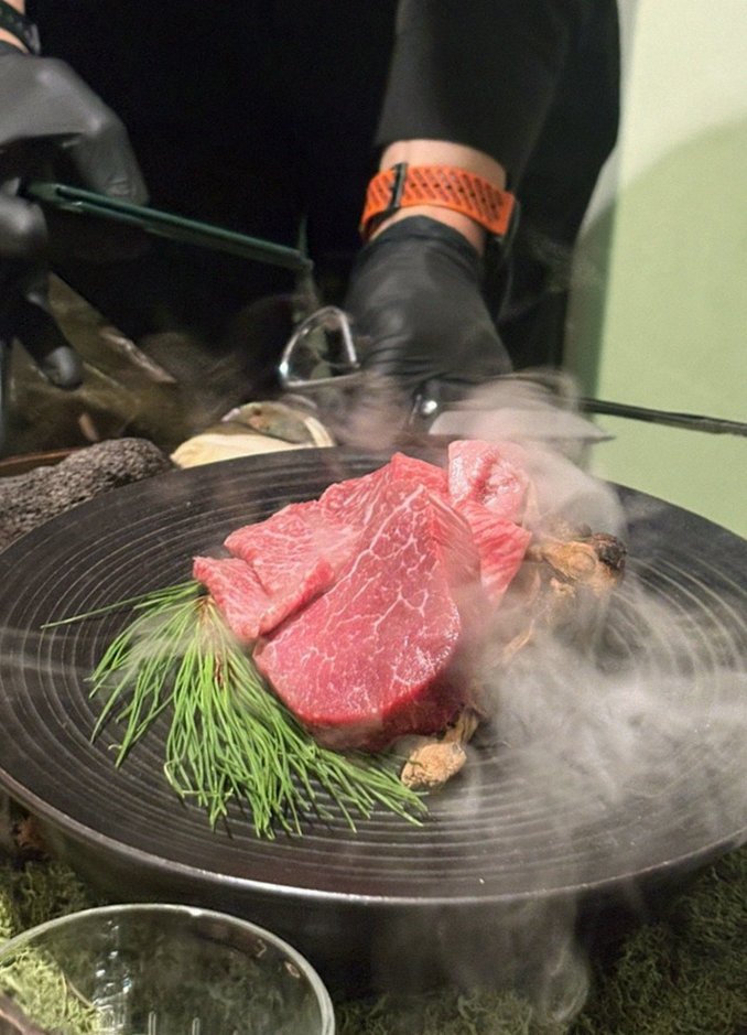 DAEBOJUNG City Hall · the signature Hanwoo showing — marbled beef cuts and caviar presented in a display chest
