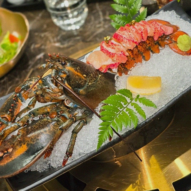 DAEBOJUNG Yeouido · the signature Hanwoo showing — marbled beef cuts and caviar presented in a display chest