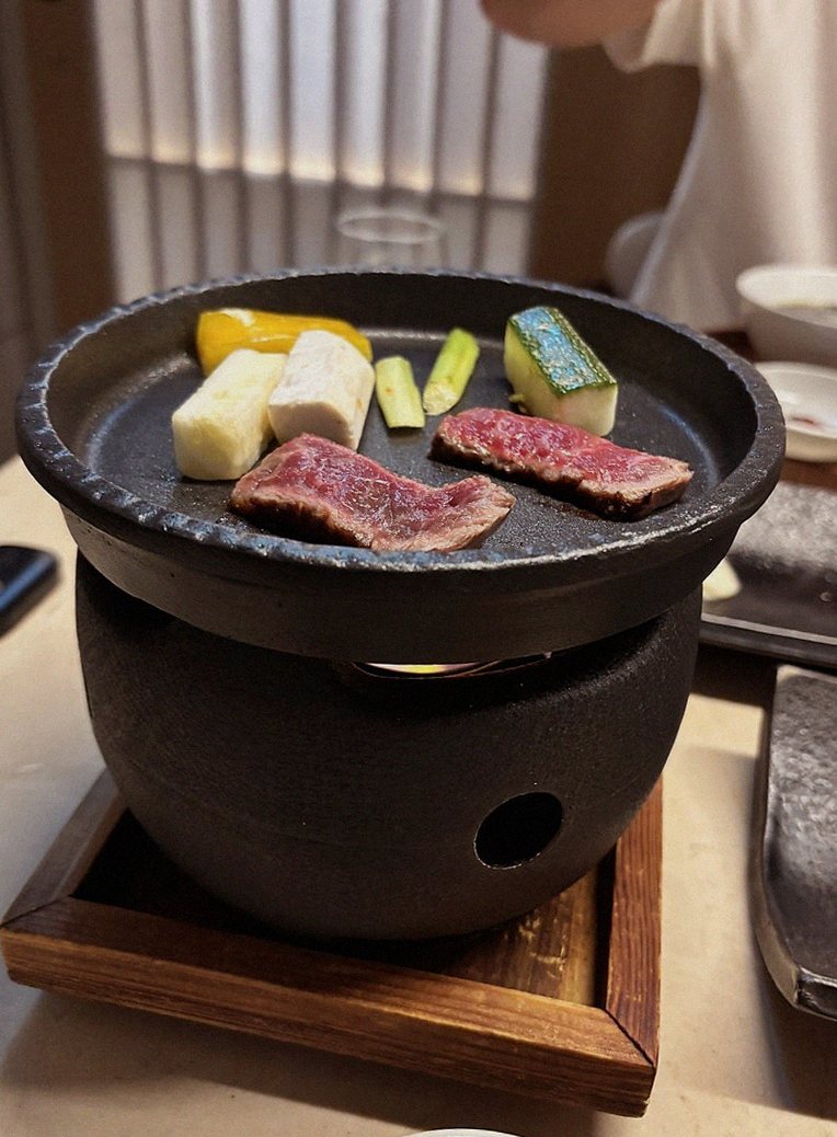 WOOARA Yeouido · the signature Hanwoo showing — marbled beef cuts and caviar presented in a display chest