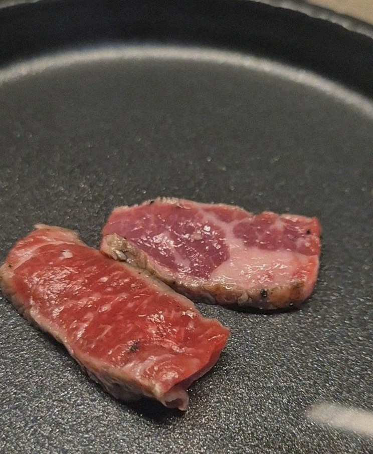 WOOARA Yeouido · premium marbled Hanwoo beef presented before grilling