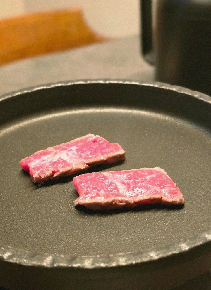 GOWOOGA Yeouido · premium marbled Hanwoo beef presented before grilling