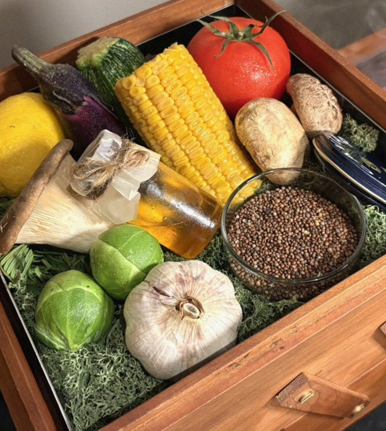 WOOARA Yeouido · the signature Hanwoo showing — marbled beef cuts and caviar presented in a display chest