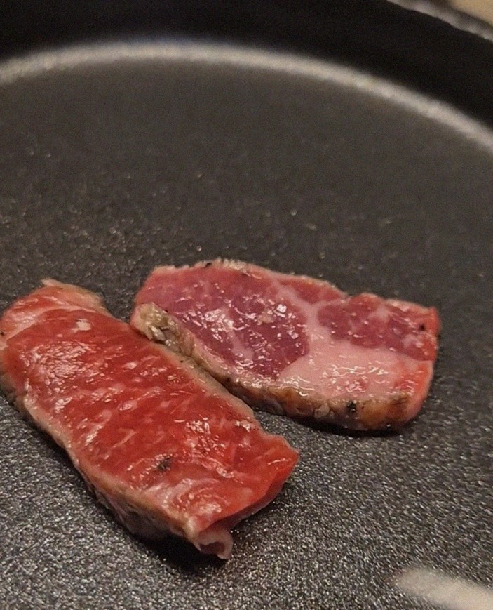 WOOARA Yeouido · premium marbled Hanwoo beef presented before grilling