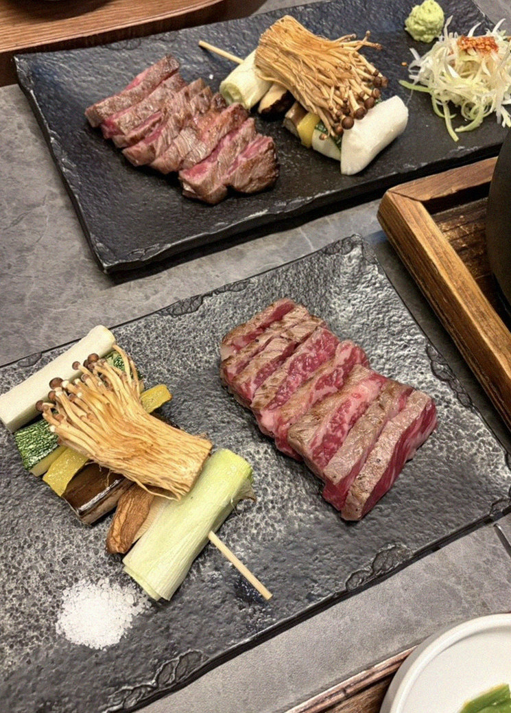 GOWOOGA Yeouido · premium marbled Hanwoo beef presented before grilling