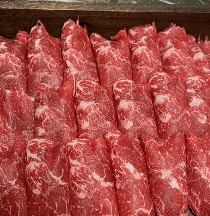 DAEBOJUNG City Hall · premium marbled Hanwoo beef presented before grilling