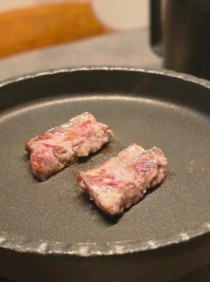 GOWOOGA Yeouido · premium marbled Hanwoo beef presented before grilling