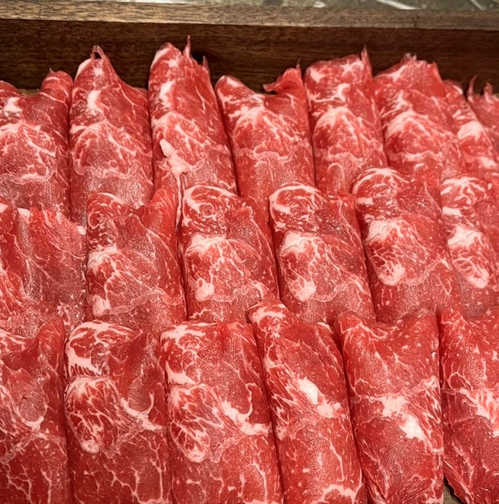 DAEBOJUNG City Hall · premium marbled Hanwoo beef presented before grilling