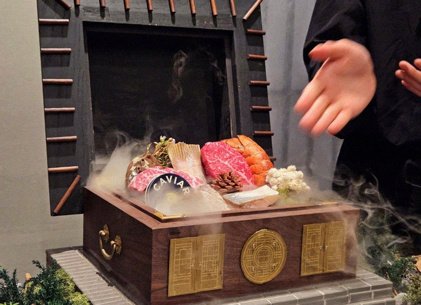 GOWOOGA Gangnam·Yeoksam · the signature Hanwoo showing — marbled beef cuts and caviar presented in a display chest